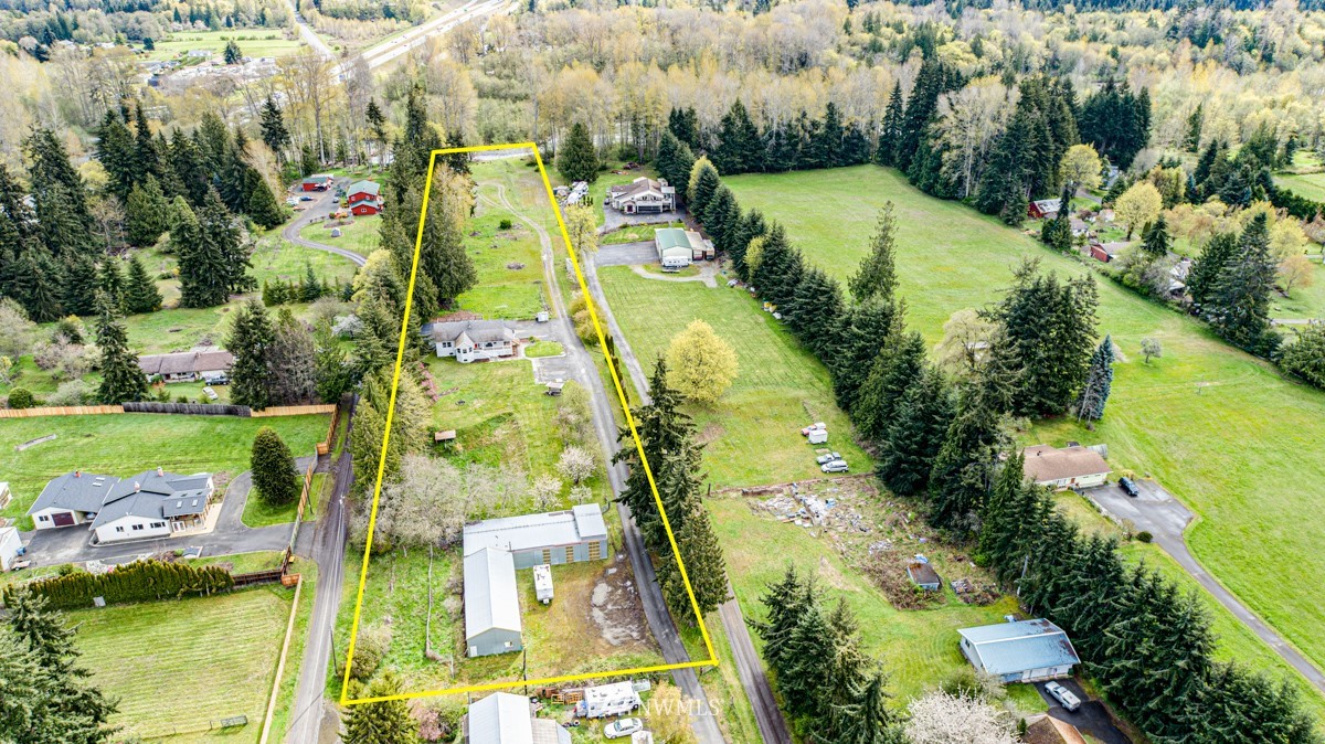 155 Taylor Cutoff Road Sequim, WA 98382 - Photo 35 of 37 an aerial view of residential houses with outdoor space