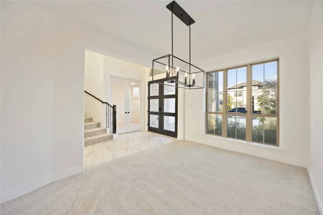 a view of a room with a large window