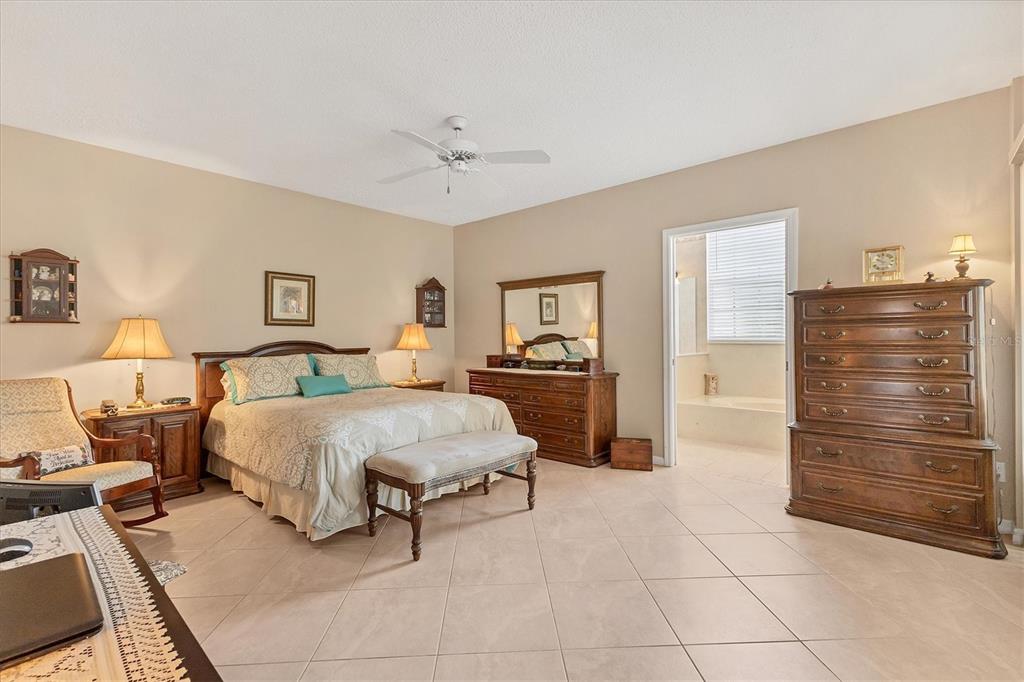 1412 Colony Place Venice, FL 34292 - Photo 22 of 55 a bedroom with a bed and closet