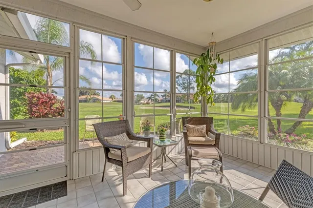 a view of backyard with patio