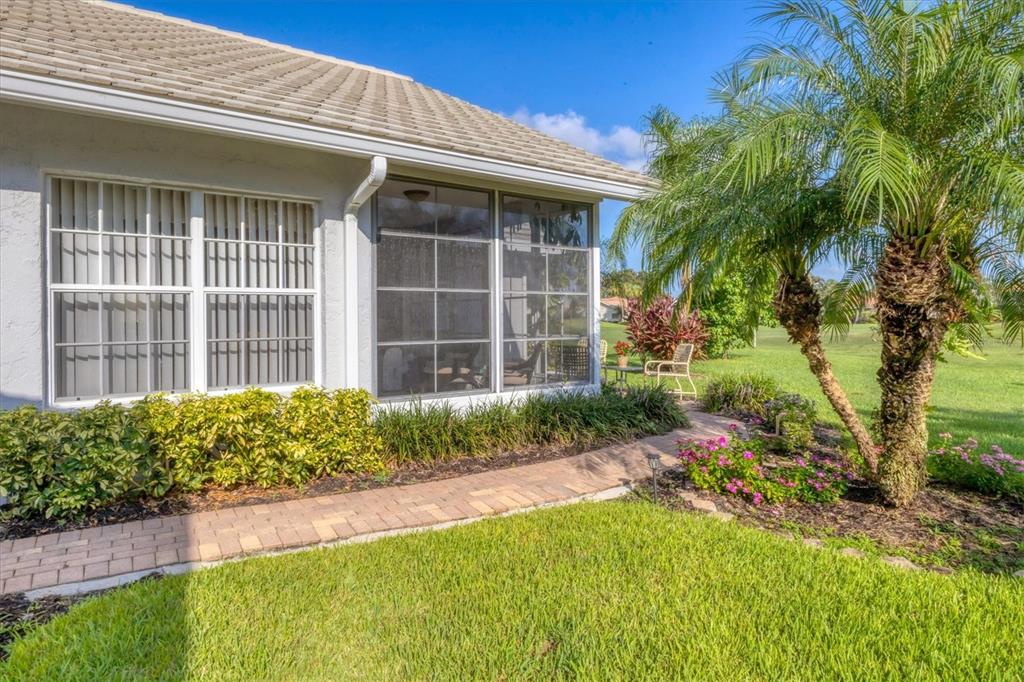 1412 Colony Place Venice, FL 34292 - Photo 40 of 55 a front view of a house with garden
