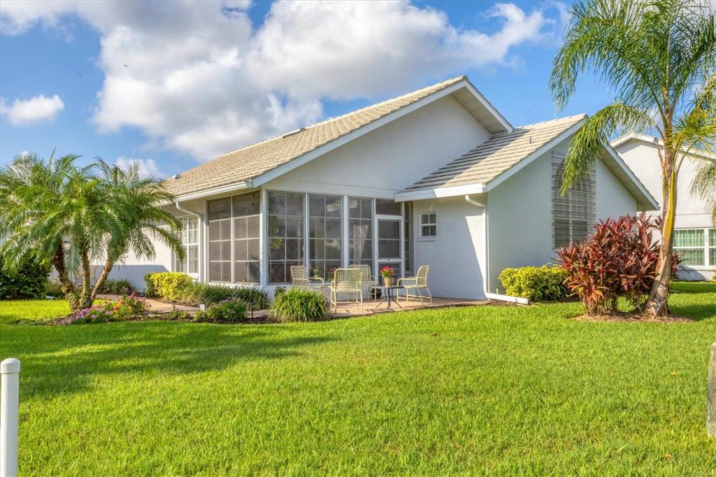 1412 Colony Place Venice, FL 34292 - Photo 43 of 55 a front view of house with yard and green space