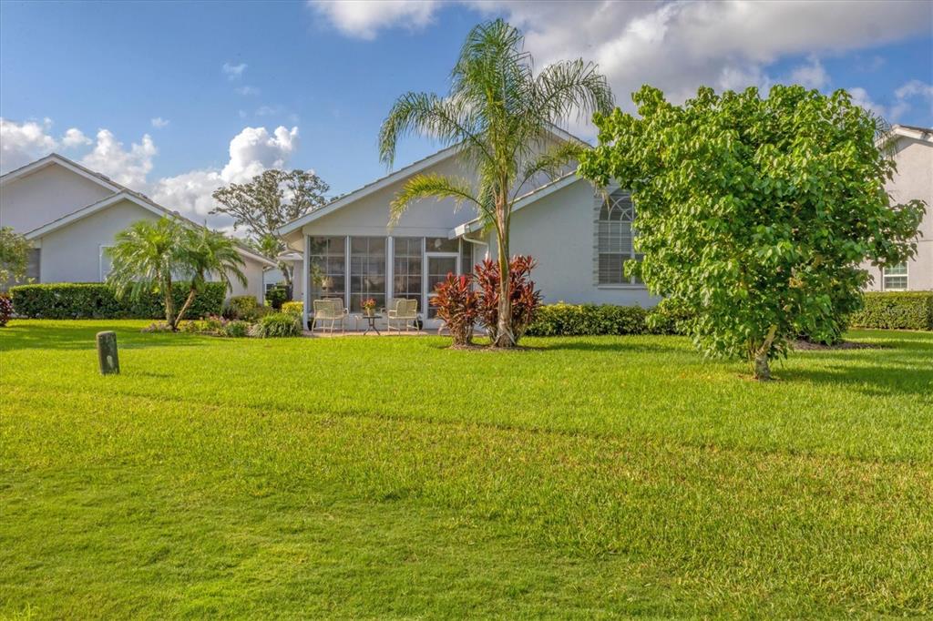 1412 Colony Place Venice, FL 34292 - Photo 44 of 55 a front view of house with yard and green space