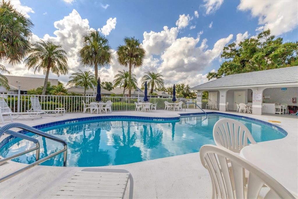 1412 Colony Place Venice, FL 34292 - Photo 50 of 55 a view of a swimming pool with a patio