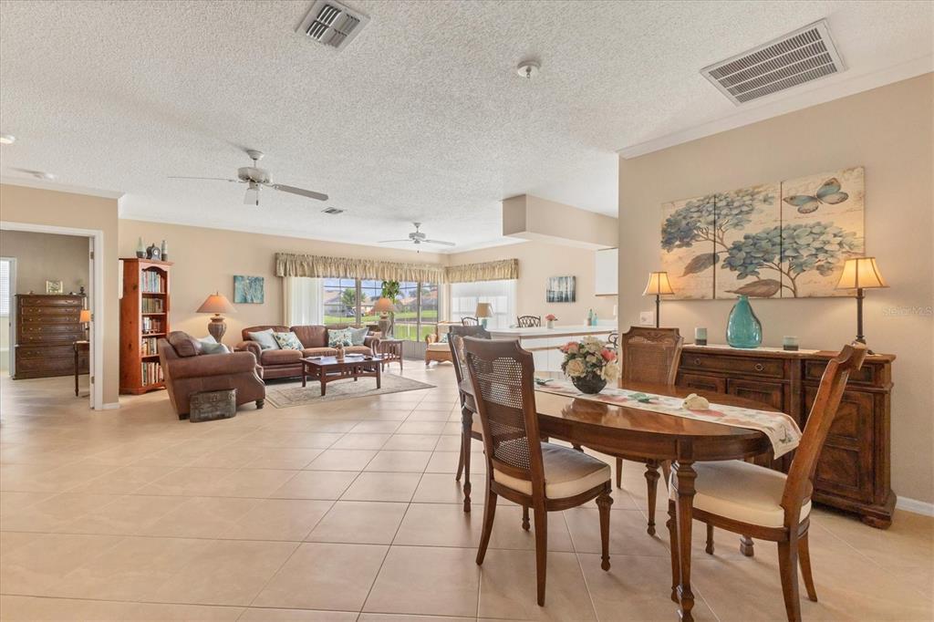 1412 Colony Place Venice, FL 34292 - Photo 5 of 55 a view of a dining room with furniture