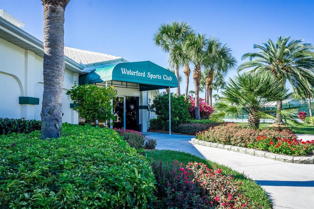 1412 Colony Place Venice, FL 34292 - Photo 51 of 55 a front view of a house with a garden