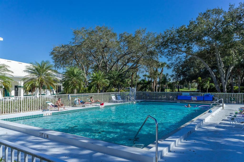1412 Colony Place Venice, FL 34292 - Photo 52 of 55 a view of a backyard with sitting area
