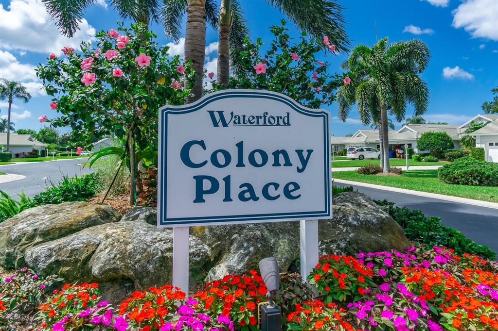 1412 Colony Place Venice, FL 34292 - Photo 54 of 55 a sign that is sitting in front of flowers