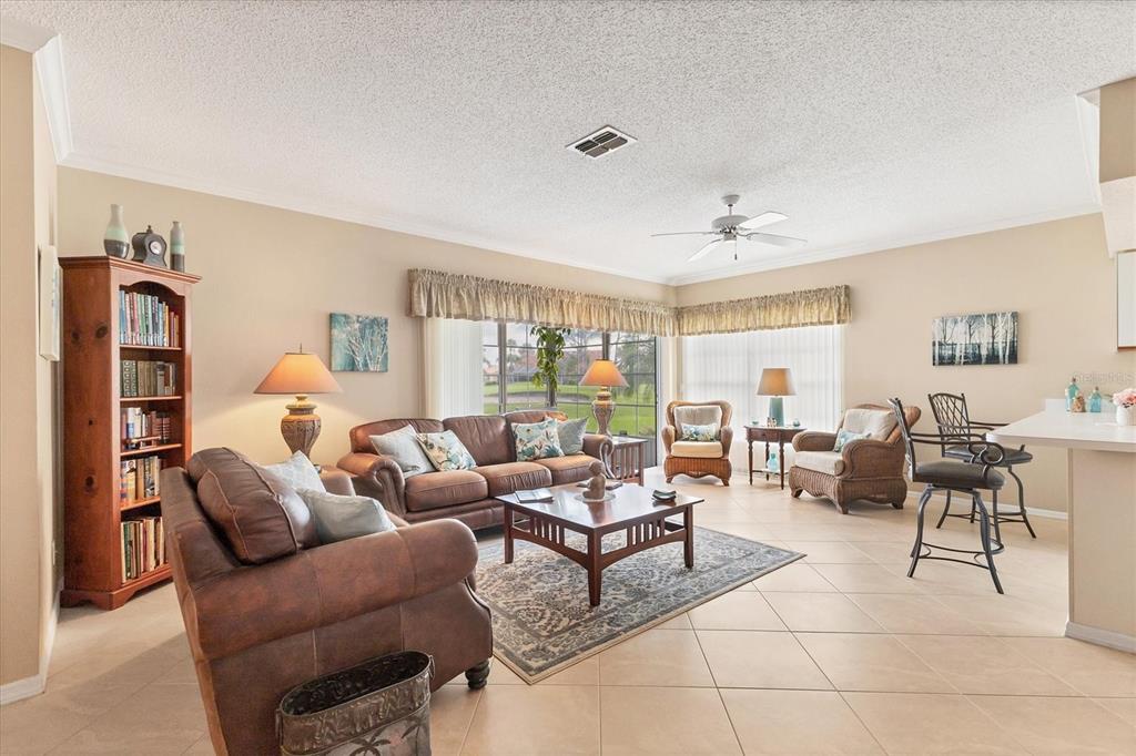 1412 Colony Place Venice, FL 34292 - Photo 6 of 55 a living room with furniture and a large window