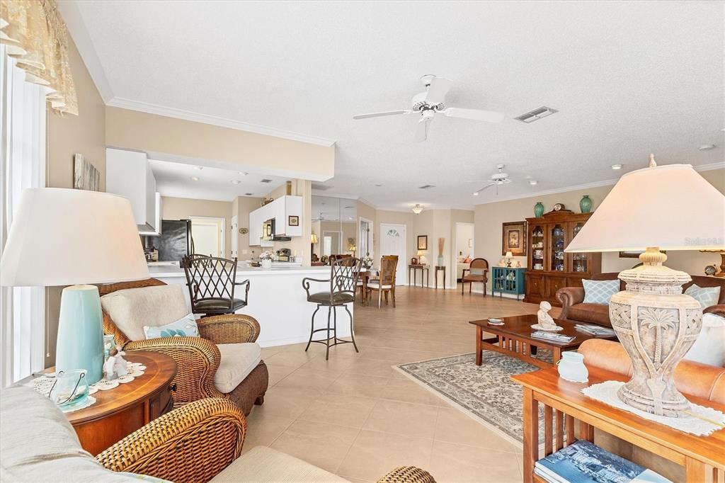 1412 Colony Place Venice, FL 34292 - Photo 9 of 55 a living room with furniture and a rug