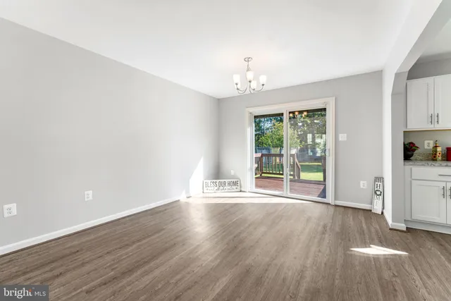 a kitchen with a sink cabinets and window