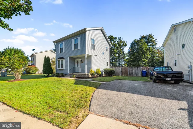 a house view with a garden space