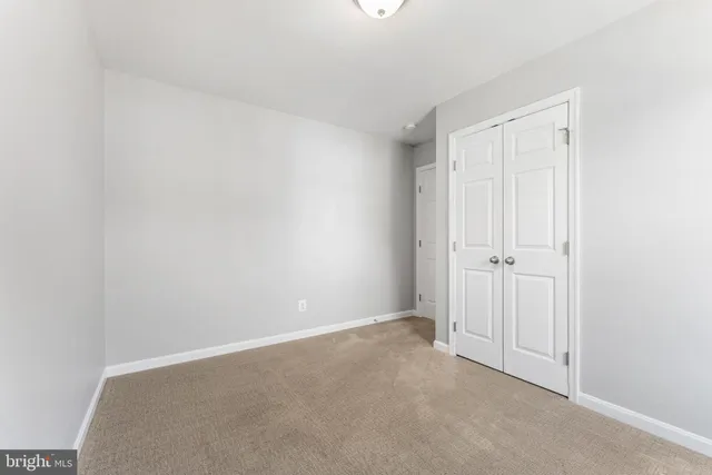 a view of deck with a large trees