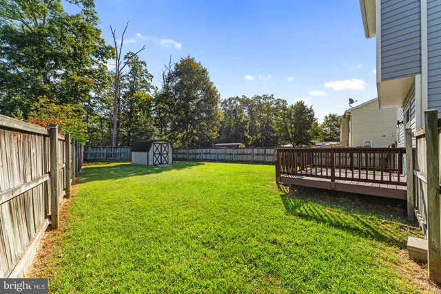a view of garden with deck