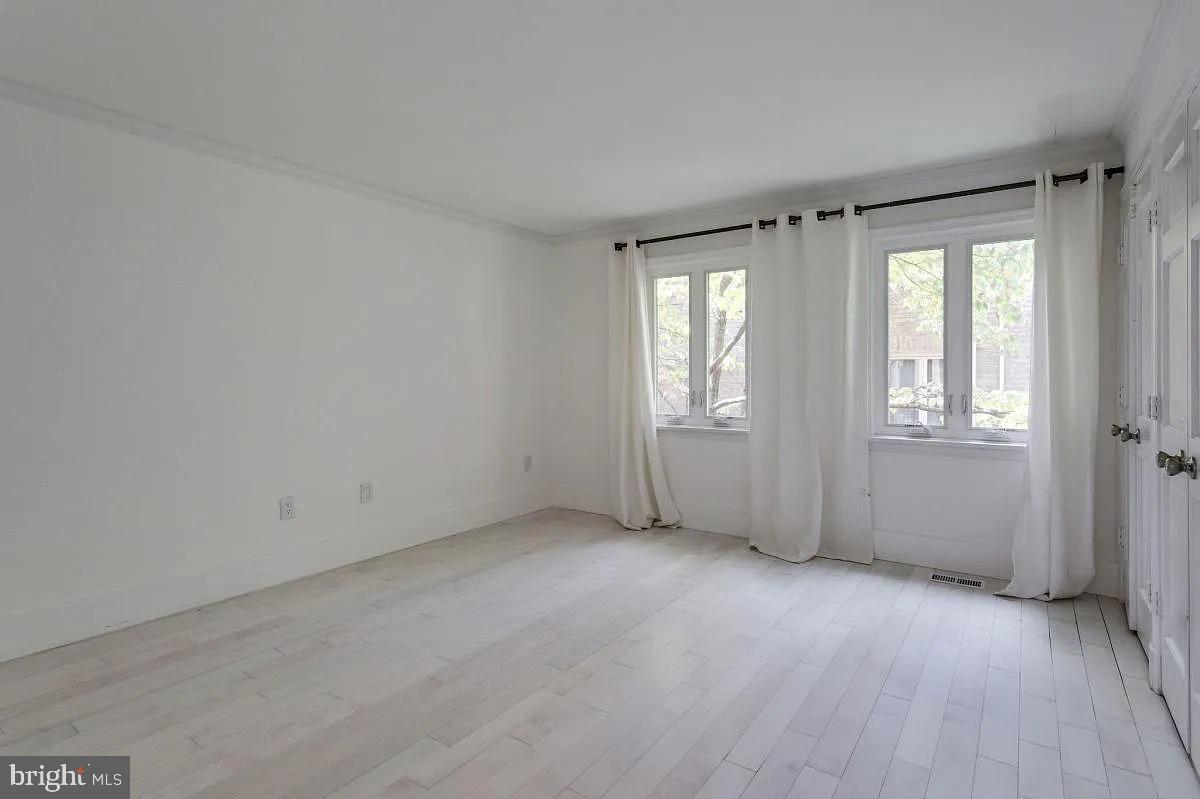 4611 Charleston Terrace Northwest Washington, DC 20007 - Photo 28 of 55 a view of an empty room with a window