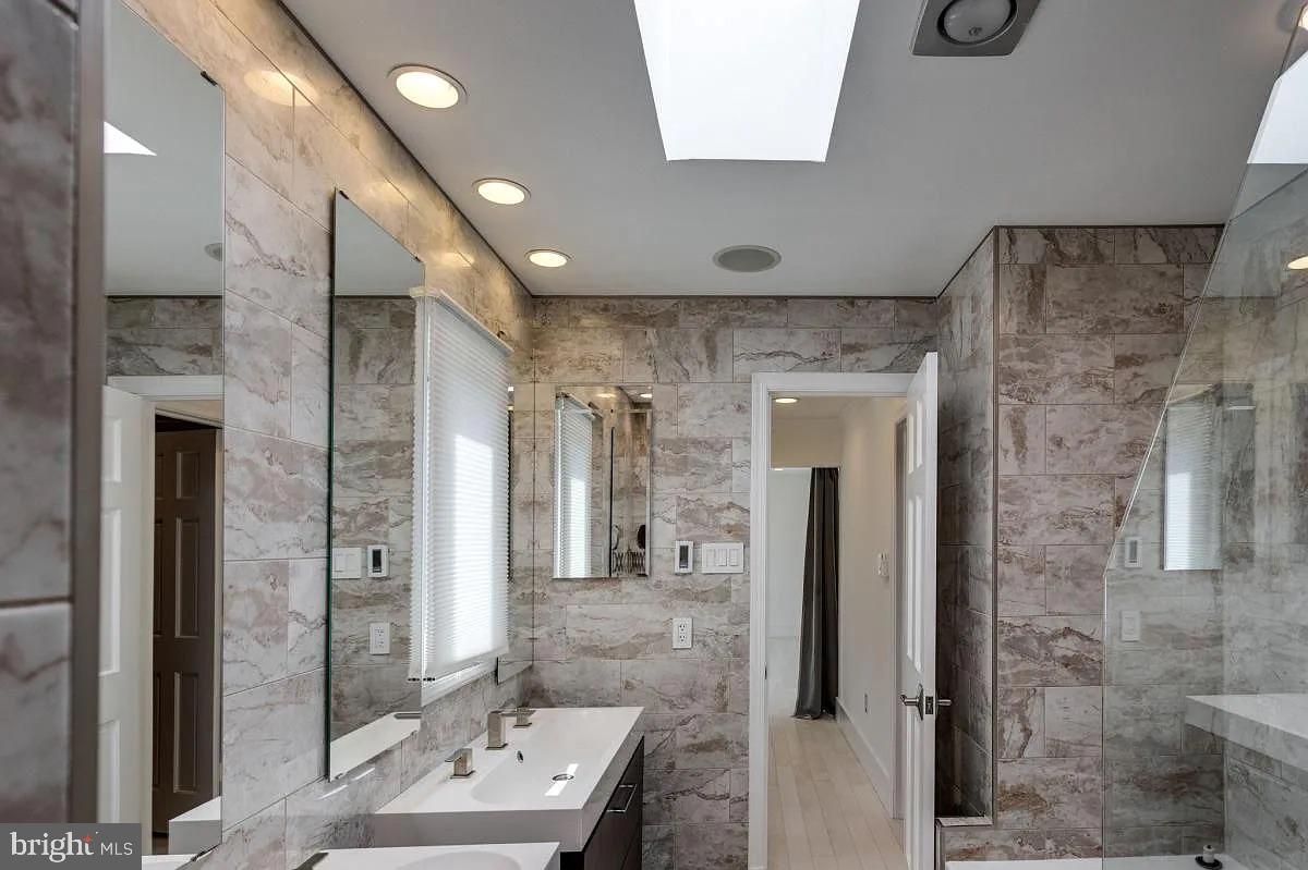 4611 Charleston Terrace Northwest Washington, DC 20007 - Photo 30 of 55 a bathroom with a shower