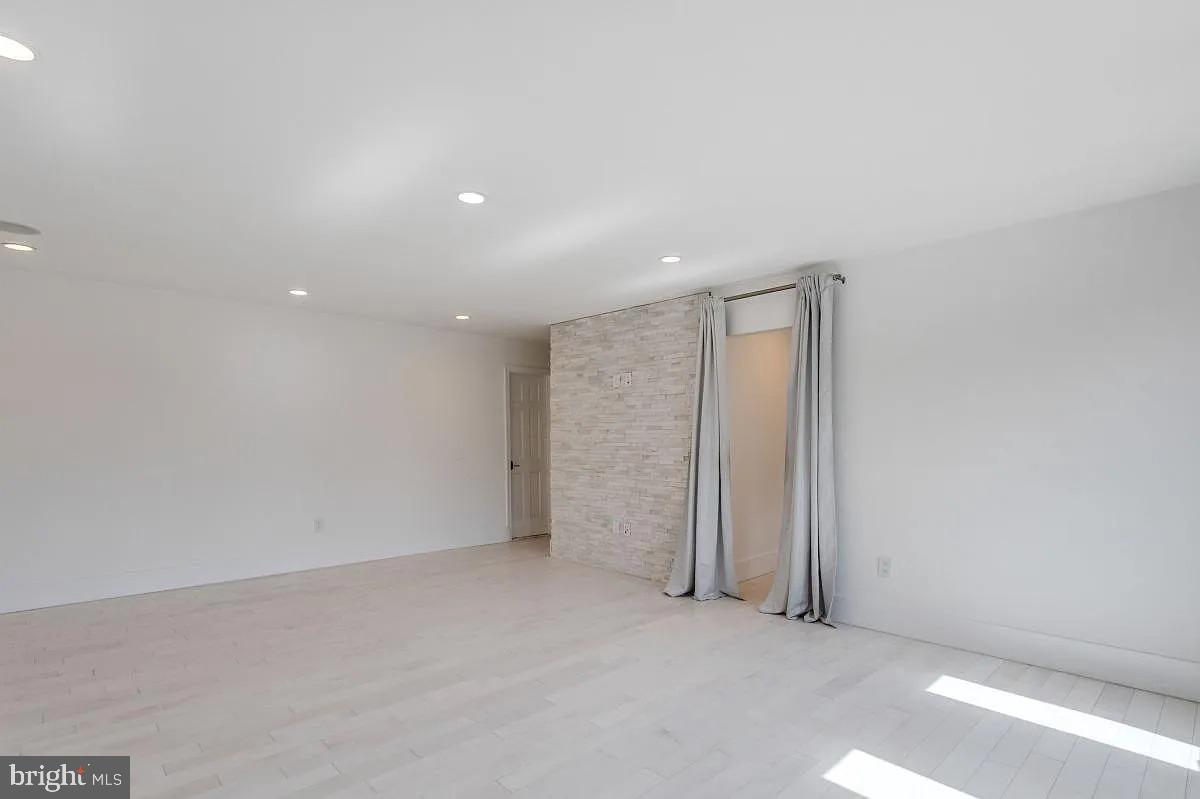 4611 Charleston Terrace Northwest Washington, DC 20007 - Photo 36 of 55 an empty room with closet area