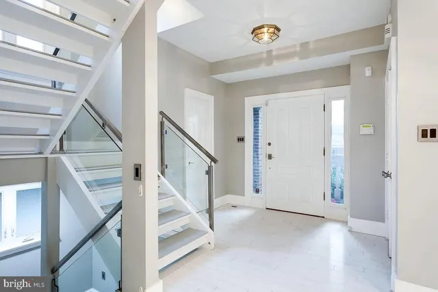 a view of a hallway with staircase