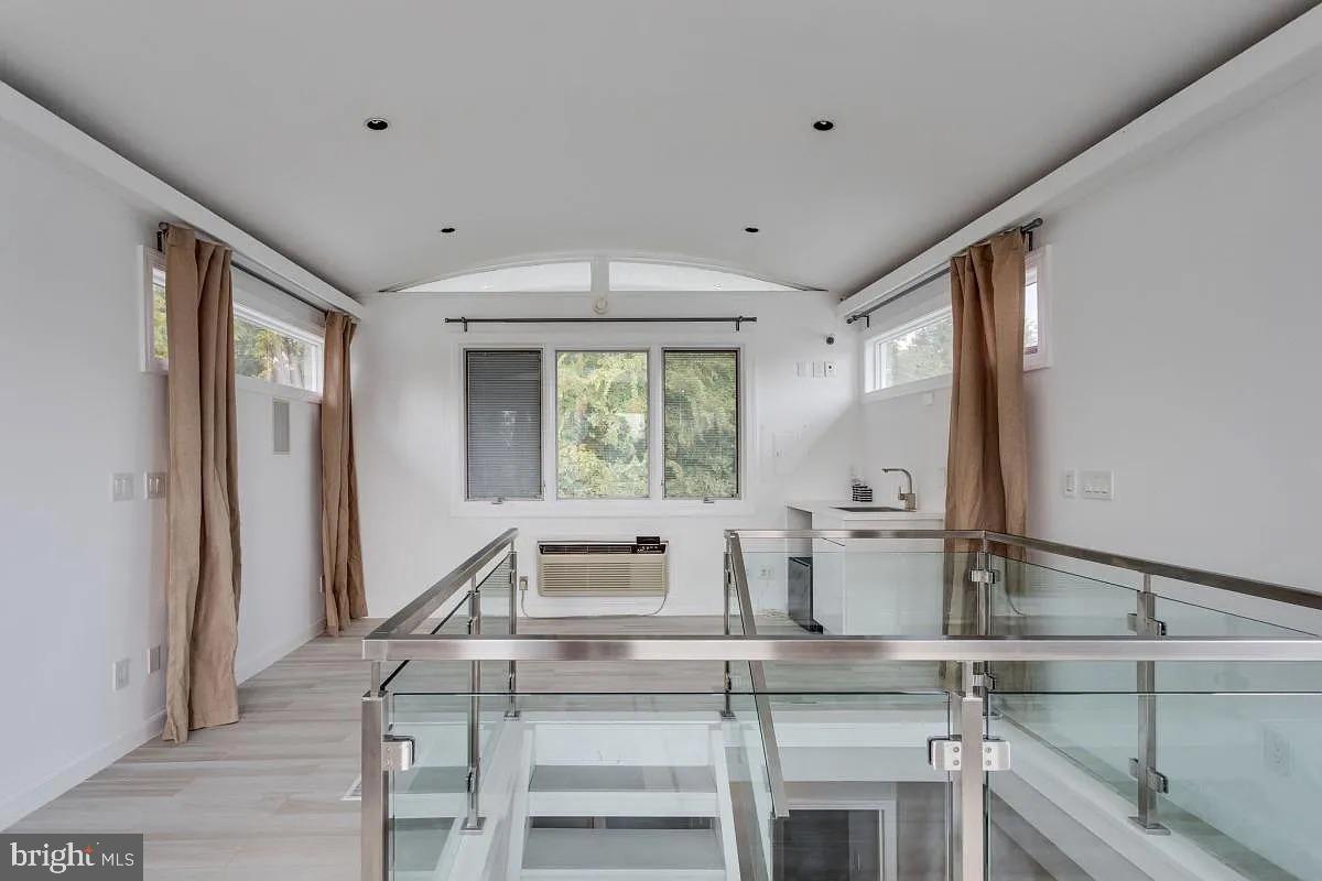 4611 Charleston Terrace Northwest Washington, DC 20007 - Photo 41 of 55 a kitchen with a sink appliances and cabinets