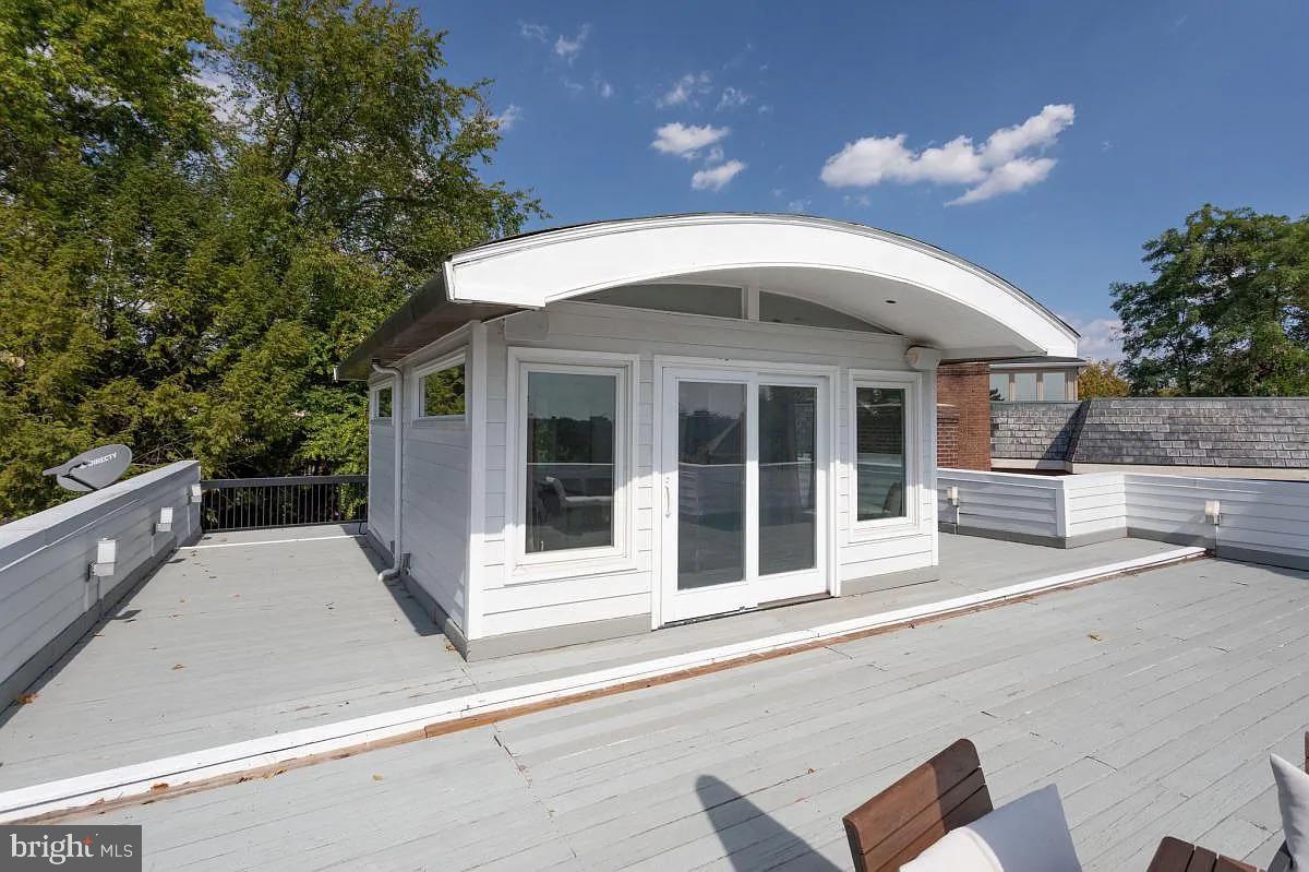 4611 Charleston Terrace Northwest Washington, DC 20007 - Photo 43 of 55 a front view of a house with a garage
