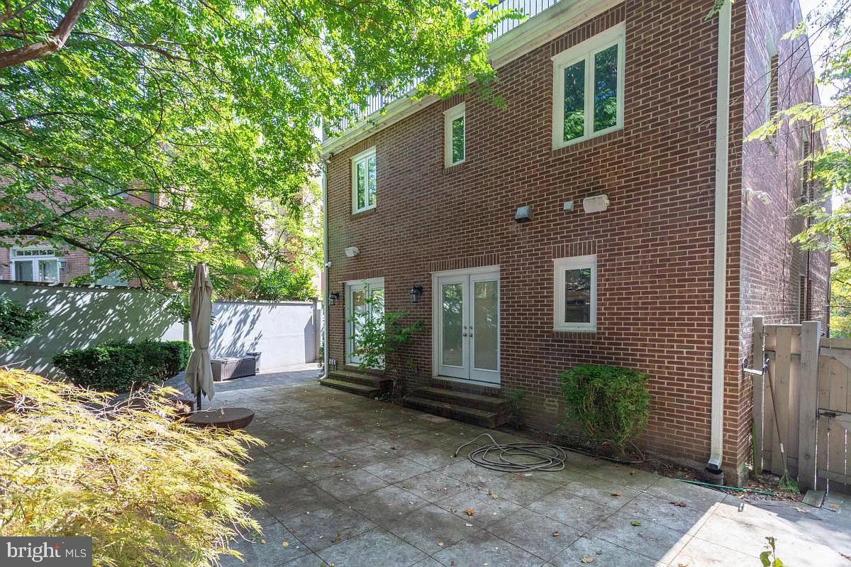 4611 Charleston Terrace Northwest Washington, DC 20007 - Photo 49 of 55 a view of a house with backyard and garden