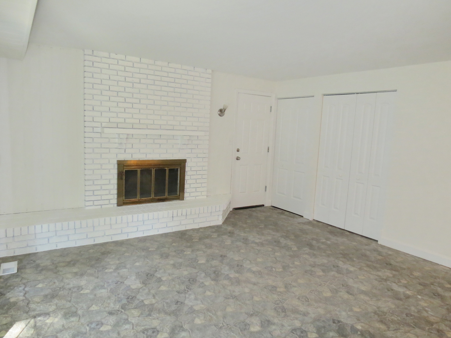 231 Charlotte Lane Bolingbrook, IL 60440 - Photo 13 of 37 a view of an empty room and fire place