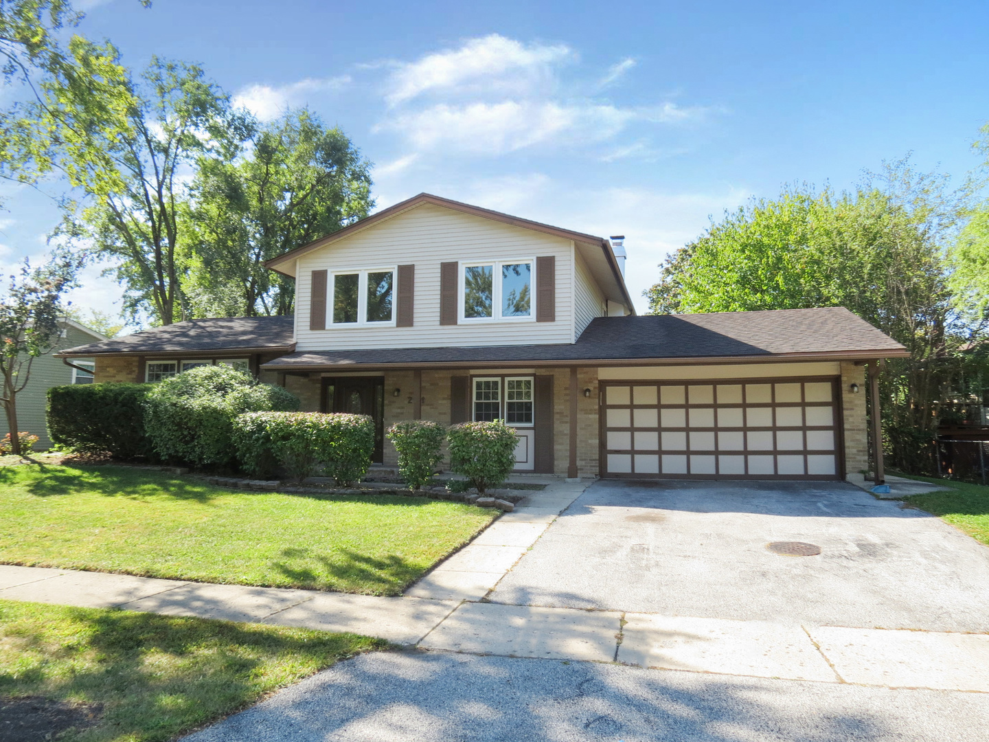 231 Charlotte Lane Bolingbrook, IL 60440 - Photo 2 of 37 a front view of a house with a yard