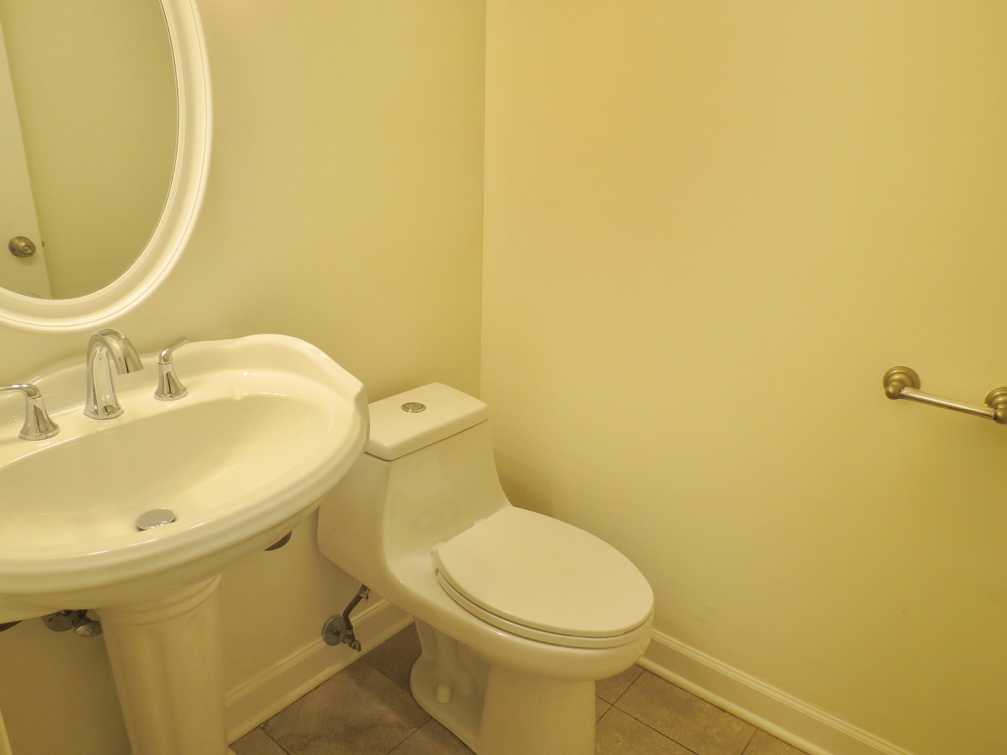 231 Charlotte Lane Bolingbrook, IL 60440 - Photo 26 of 37 a bathroom with a sink and a mirror