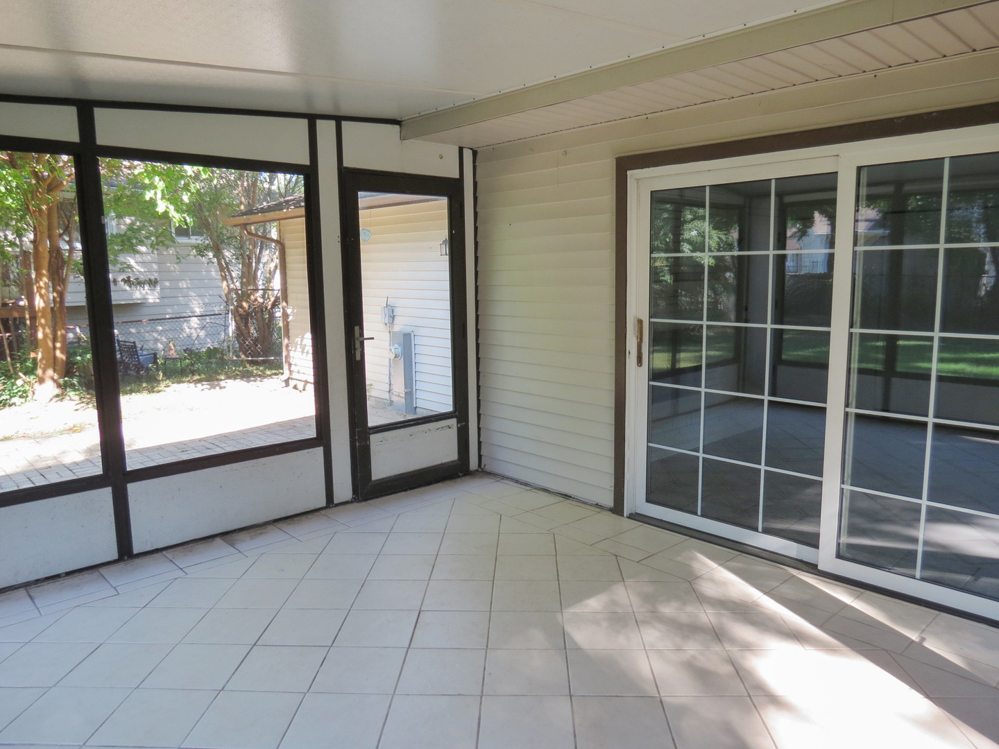 231 Charlotte Lane Bolingbrook, IL 60440 - Photo 27 of 37 a view of an empty room with a large window
