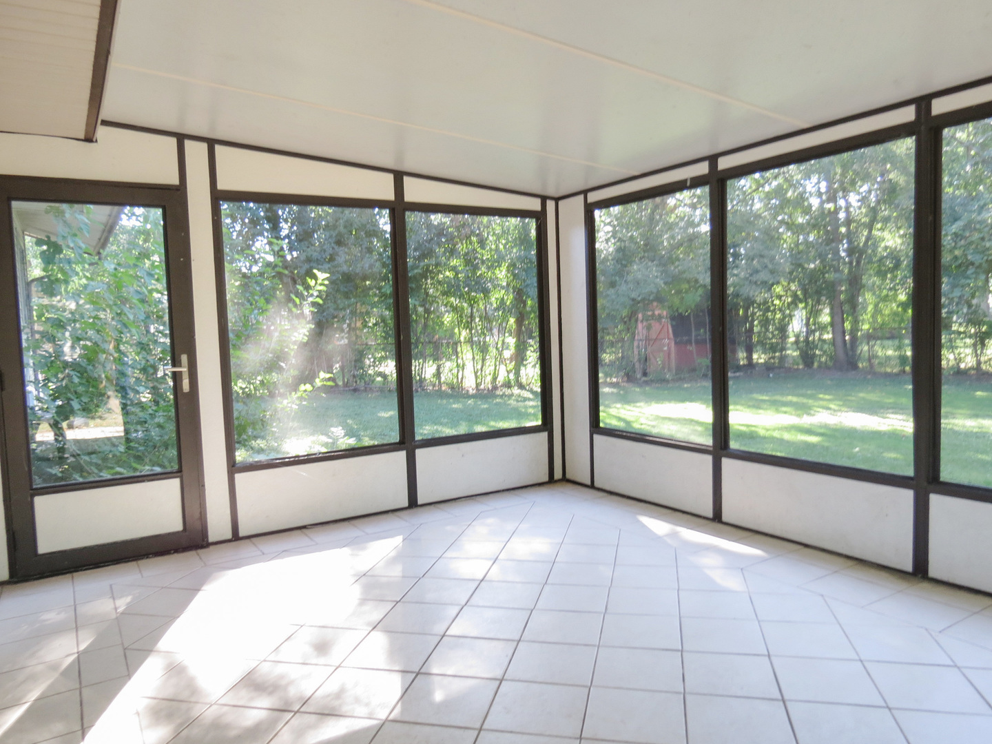 231 Charlotte Lane Bolingbrook, IL 60440 - Photo 28 of 37 a view of an empty room with windows and balcony view