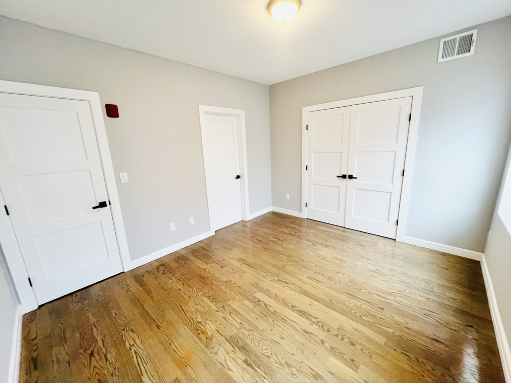 47-49 Walnut Street, Unit 2 Boston, MA 02122 - Photo 5 of 12 a view of empty room