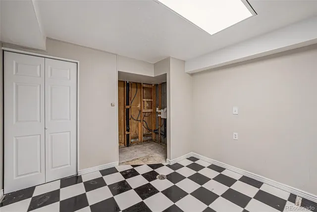 a black and white checkered floor with a black white checkered floor
