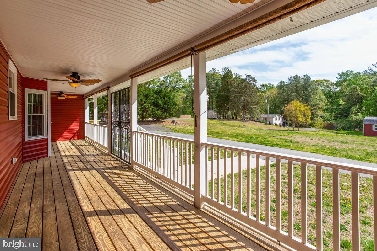 400 Adelina Road Prince Frederick, MD 20678 - Photo 5 of 57 Charming porch with scenic views.