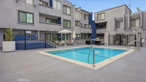a view of a building with a patio