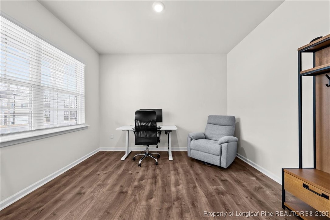 917 Ocean Court Carthage, NC 28327 - Photo 11 of 32 a living room with furniture and a wooden floor