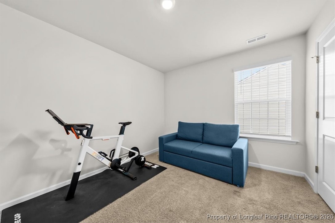 917 Ocean Court Carthage, NC 28327 - Photo 22 of 32 a living room with furniture and a window