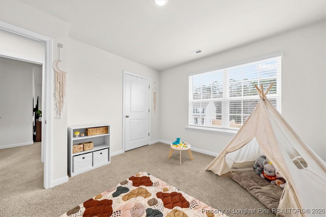 917 Ocean Court Carthage, NC 28327 - Photo 26 of 32 a living room with furniture and wooden floor