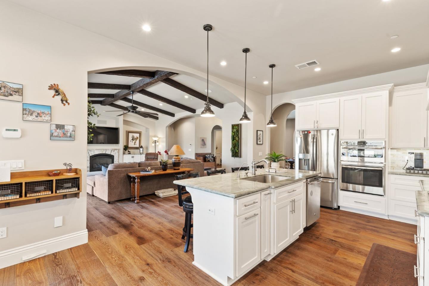 7251 Diablo Hills Road Tres Pinos, CA 95075 - Photo 13 of 60 a large kitchen with kitchen island a stove a sink a oven and wooden floors