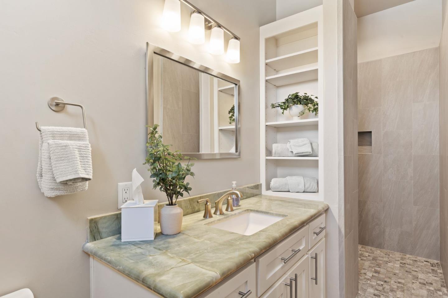 7251 Diablo Hills Road Tres Pinos, CA 95075 - Photo 23 of 60 a bathroom with a granite countertop sink and a mirror
