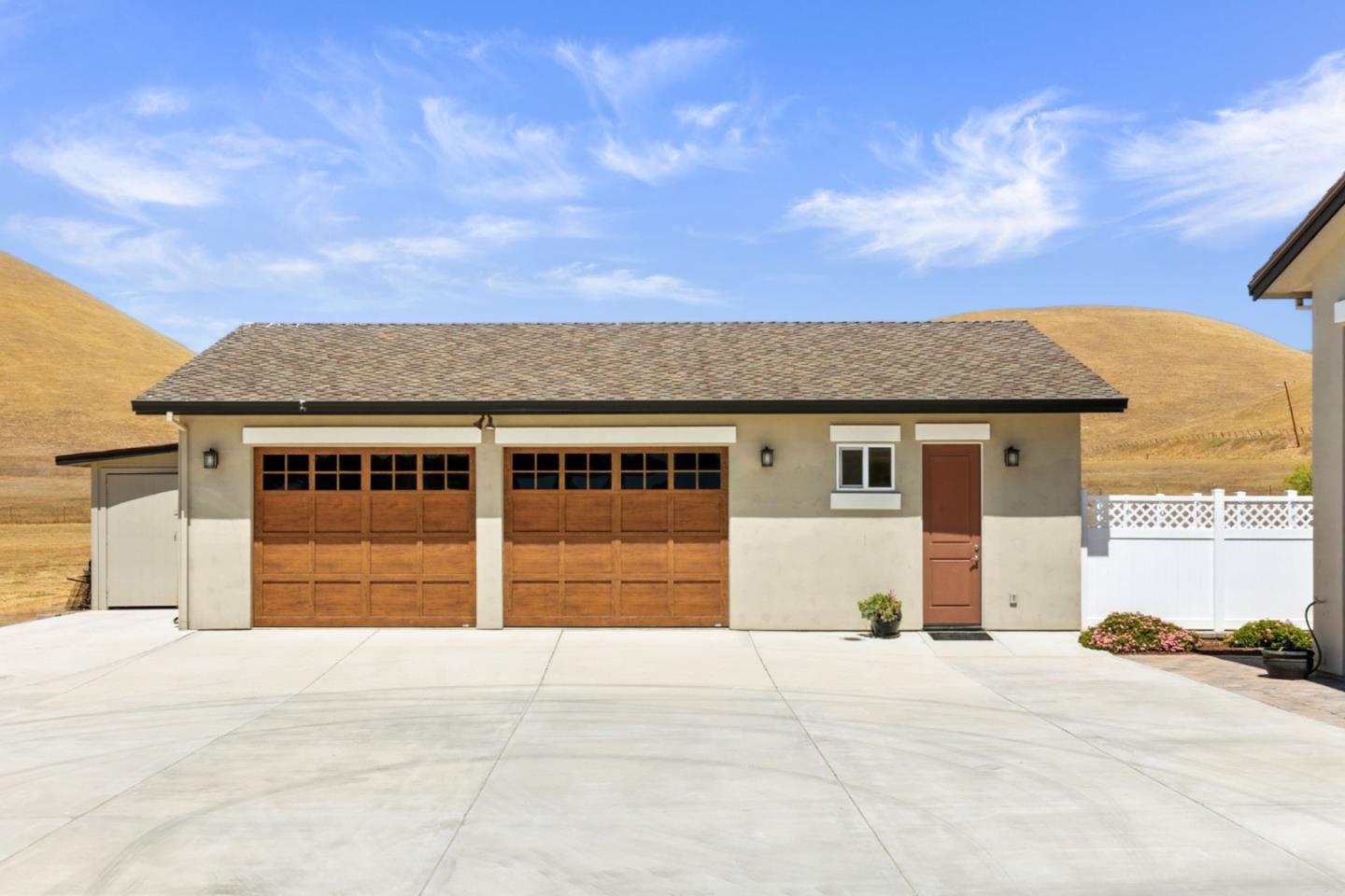 7251 Diablo Hills Road Tres Pinos, CA 95075 - Photo 31 of 60 a front view of a house with a yard