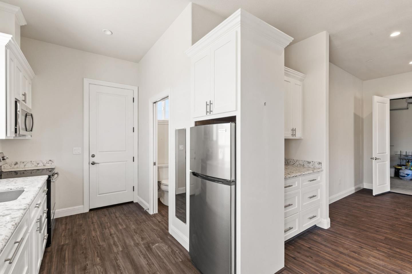 7251 Diablo Hills Road Tres Pinos, CA 95075 - Photo 34 of 60 a kitchen with stainless steel appliances a refrigerator and a stove top oven
