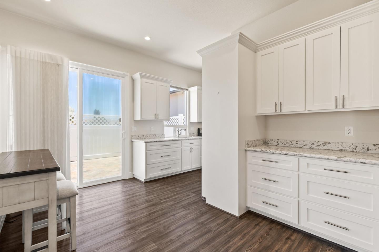 7251 Diablo Hills Road Tres Pinos, CA 95075 - Photo 36 of 60 a kitchen with white cabinets and sink