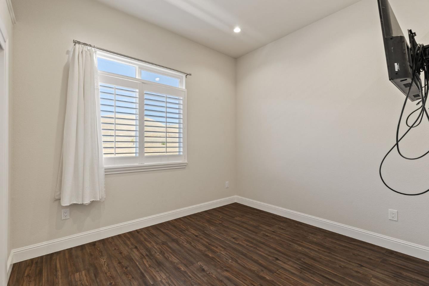 7251 Diablo Hills Road Tres Pinos, CA 95075 - Photo 38 of 60 a view of a room with wooden floor and window