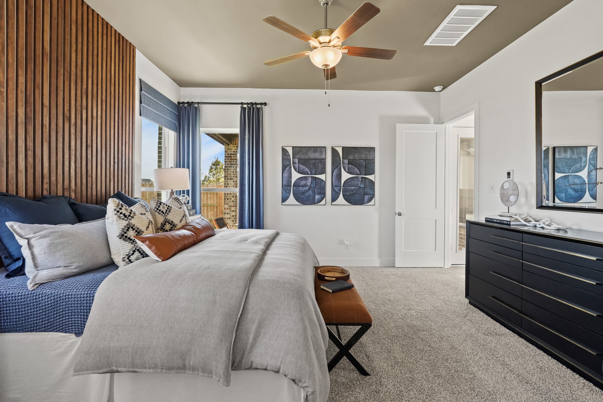 2718 Peach Vly Road Fulshear, TX 77423 - Photo 11 of 45 a bedroom with furniture and a large window