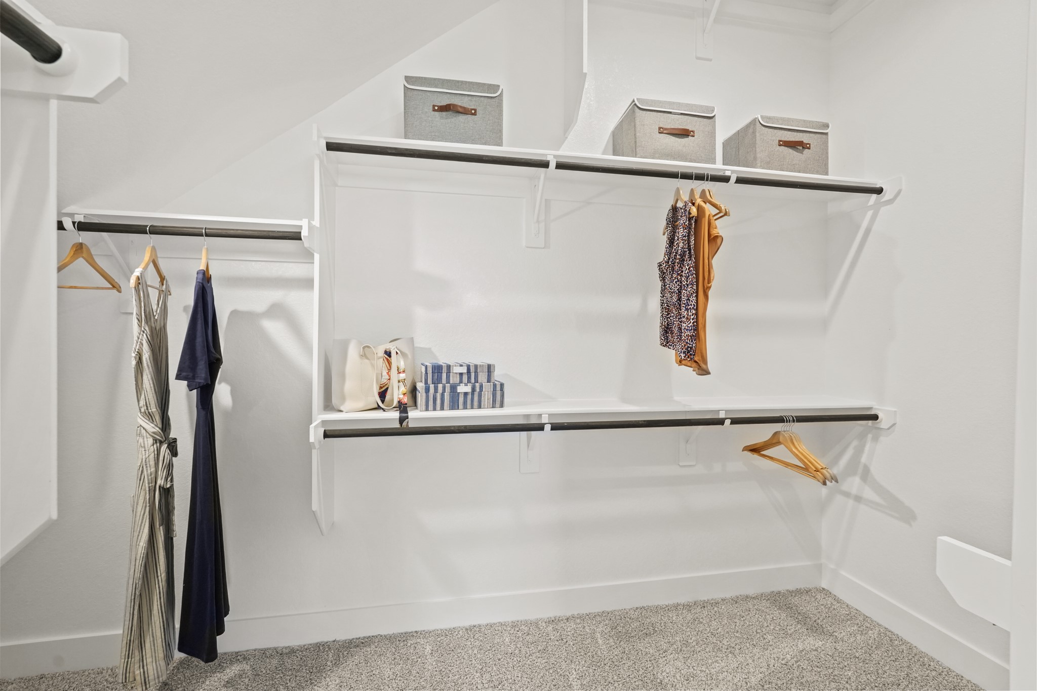 2718 Peach Vly Road Fulshear, TX 77423 - Photo 16 of 45 a view of walk in closet with clothes and window