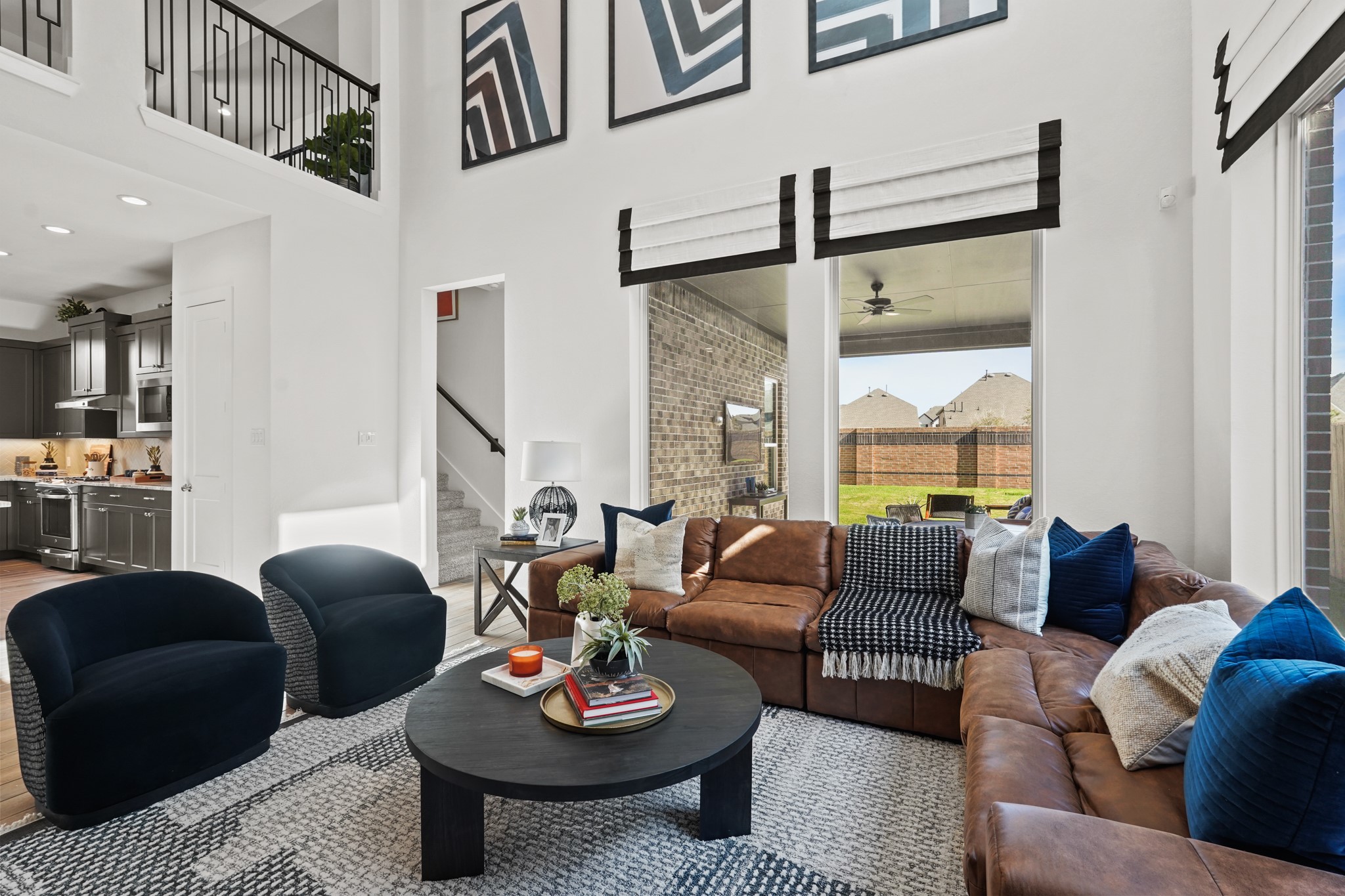 2718 Peach Vly Road Fulshear, TX 77423 - Photo 18 of 45 a living room with furniture and a floor to ceiling window