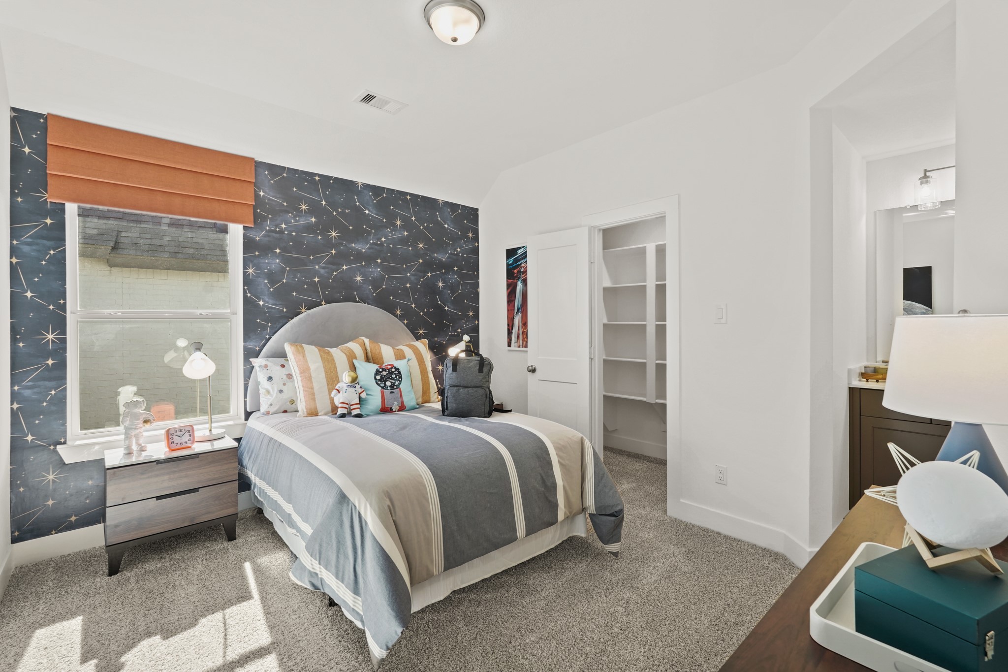 2718 Peach Vly Road Fulshear, TX 77423 - Photo 24 of 45 a bedroom with a bed and a chair