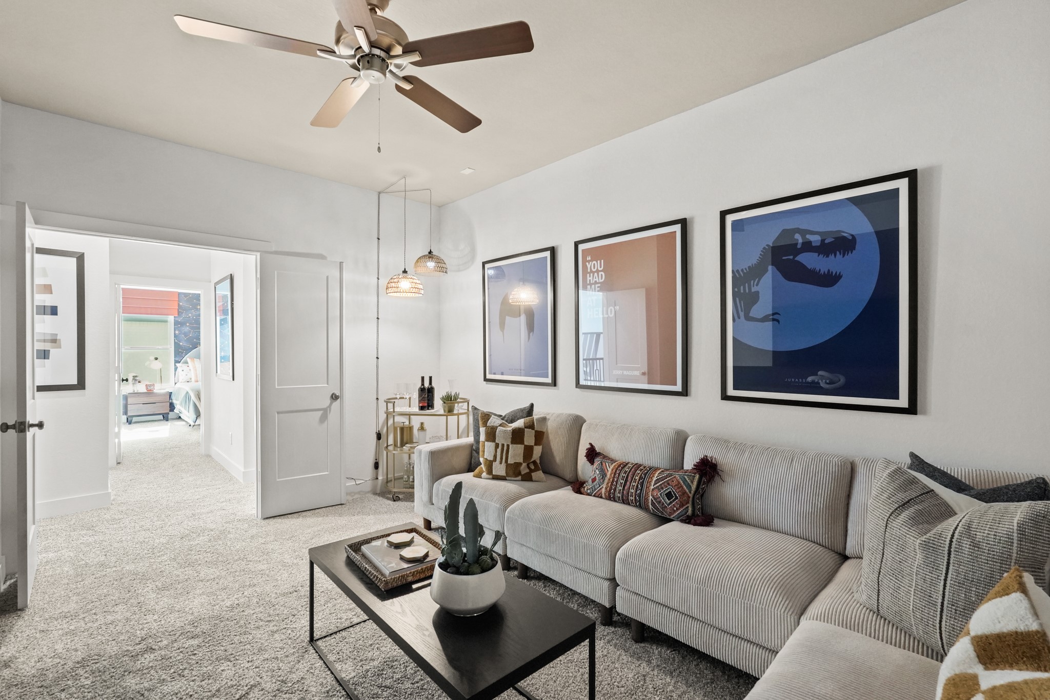 2718 Peach Vly Road Fulshear, TX 77423 - Photo 32 of 45 a living room with furniture a couch and a chandelier