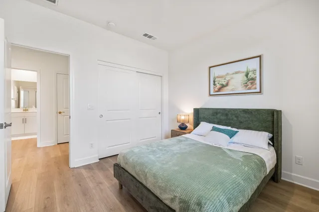 a bathroom with a double vanity sink and mirror
