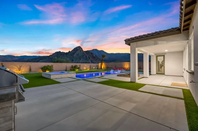 a view of a lake with a yard